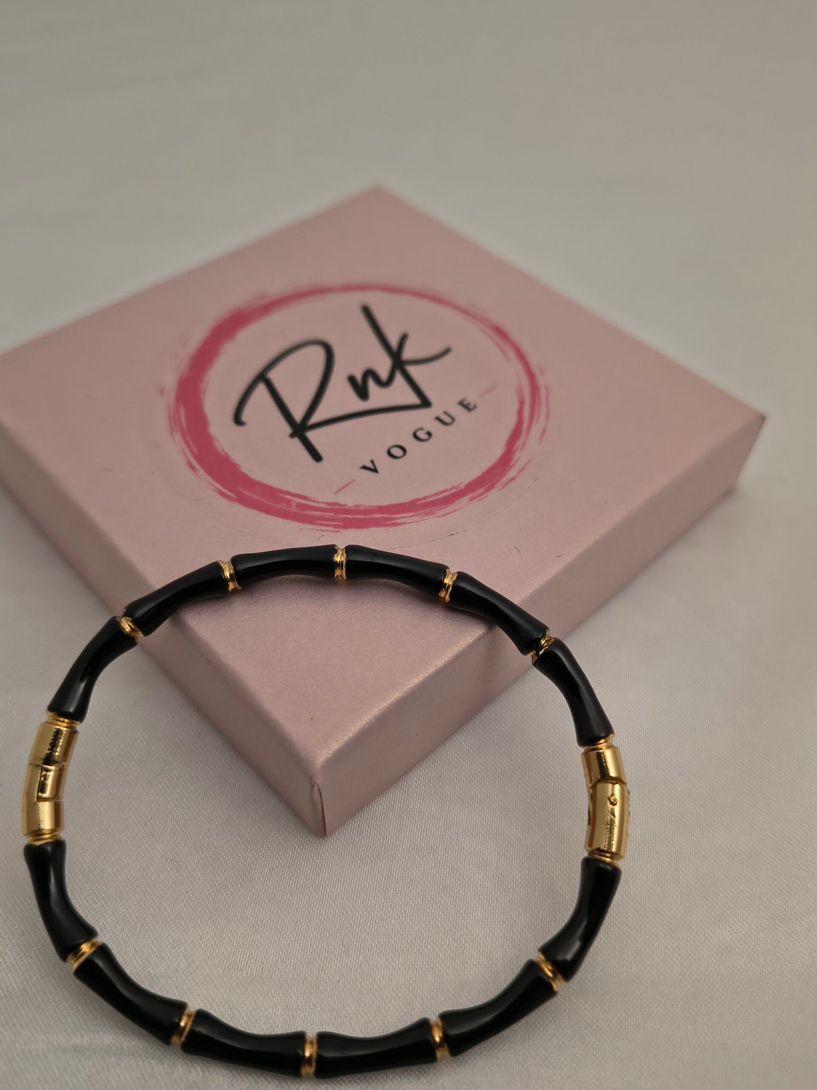 Black bamboo style kada bracelet with gold links - RNK Vogue