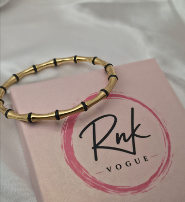 Gold bamboo kada bracelet with black link accents - RNK Vogue