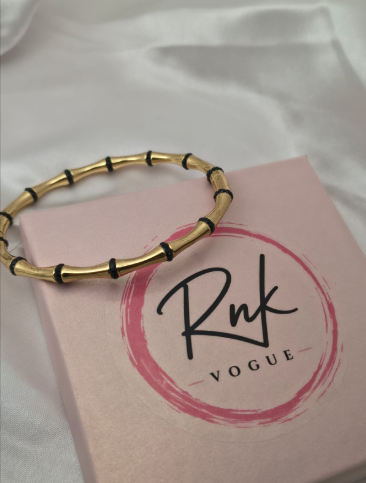 Gold bamboo kada bracelet with black link accents - RNK Vogue